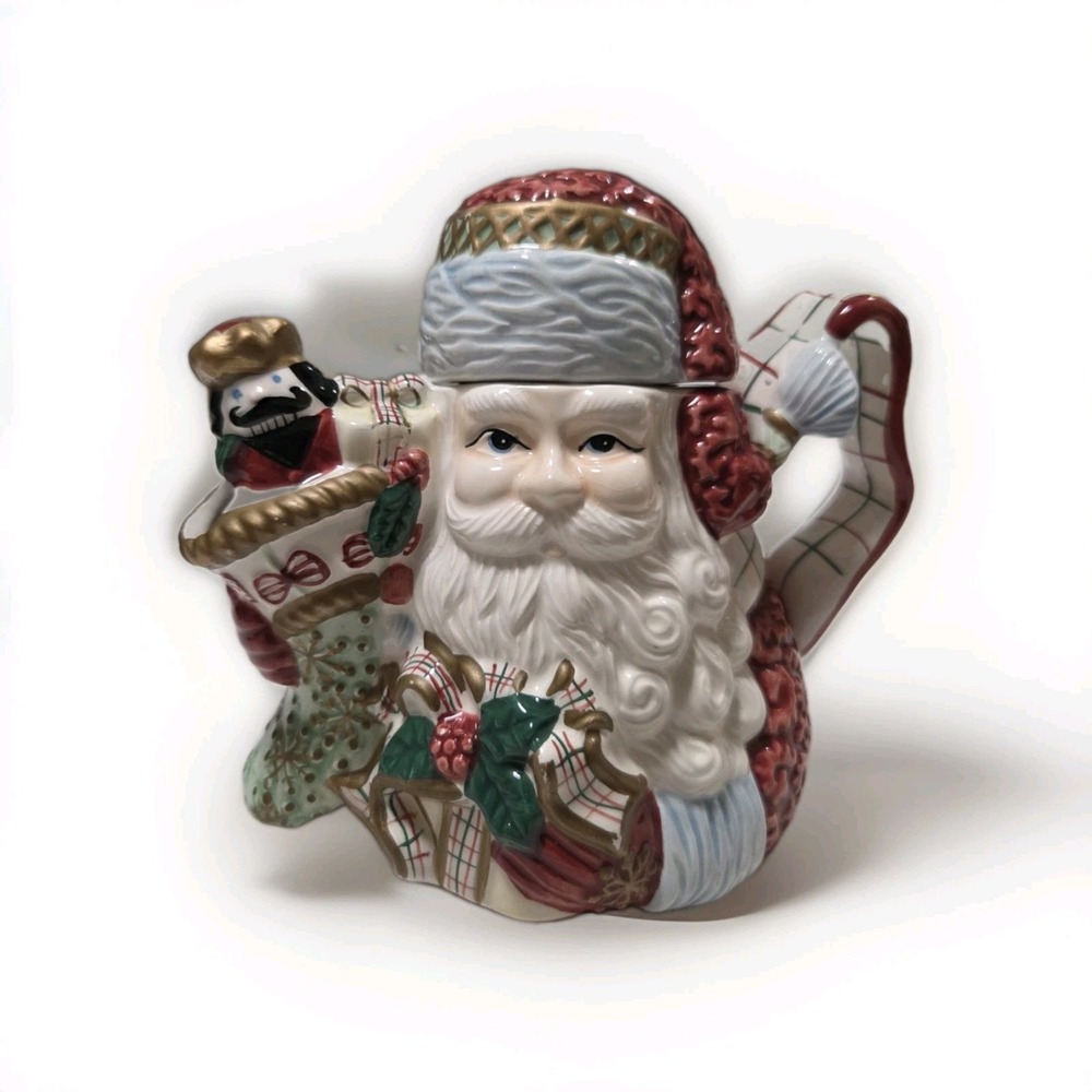 Avon Ceramic Christmas Teapot Santa Holding Presents 9.5" x 5.4" x 7" tall